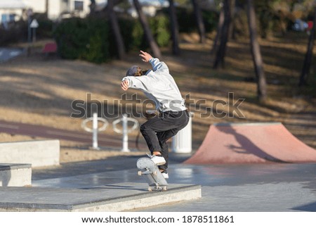 Similar – Junge Person mit Skateboard im Skatepark