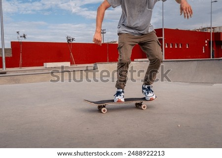 Similar – teenager practicing with skateboard at sunrise city