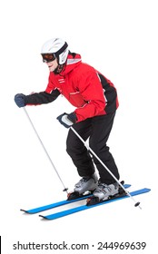 Young Man In Ski Suit Is Jumping With Skis On White Background.