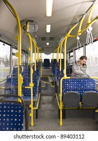 Young Man Sleeping On The Bus