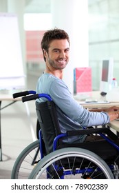 Young Man Smiling In Wheelchair