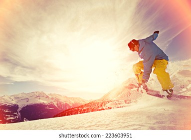 Young Man Snowboarding.