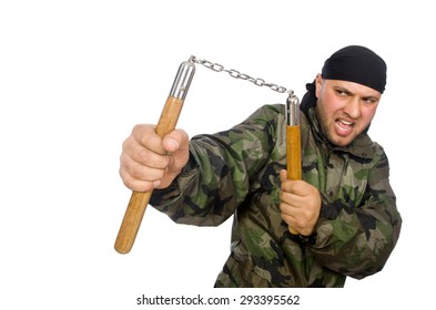 Young man in soldier uniform holding nunchaks isolated on white - Powered by Shutterstock