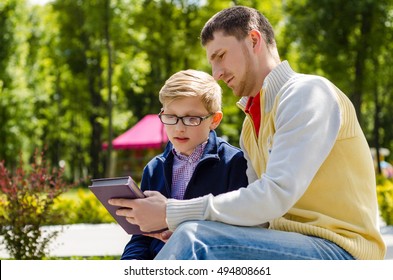 Young man is spending time with his nephew - Shutterstock ID 494808661