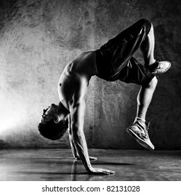 Young Man Sports Exercises. Contrast Black And White.