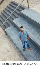 Young Man Standing Alone On Street High Angle View. Social Distance In Empty City