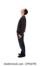 young man standing with his head looking up (isolated on white)