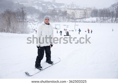 Similar – Skier from behind on the mountain