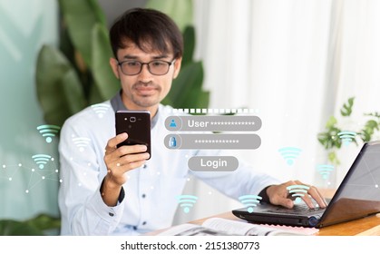 Young Man Student Or Businessman Using Smartphone With Login Wifi And Connect To Laptop During Working At Workplace, Smartphone Wifi Concept