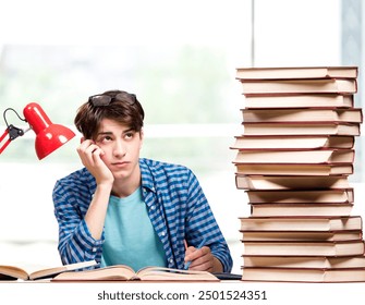 Young man student preparing for college exams - Powered by Shutterstock