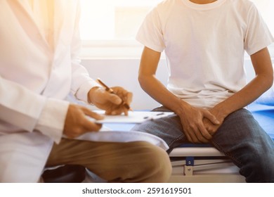 A young man suffering from erectile dysfunction seeks consultation with a specialist to identify the cause of his erectile dysfunction and seek treatment or cure for the erectile dysfunction.