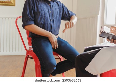A young man suffering from erectile dysfunction seeks consultation with a specialist to identify the cause of his erectile dysfunction and seek treatment or cure for the erectile dysfunction.
