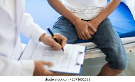 A young man suffering from erectile dysfunction seeks consultation with a specialist to identify the cause of his erectile dysfunction and seek treatment or cure for the erectile dysfunction.
