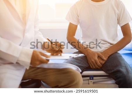 A young man suffering from erectile dysfunction seeks consultation with a specialist to identify the cause of his erectile dysfunction and seek treatment or cure for the erectile dysfunction.