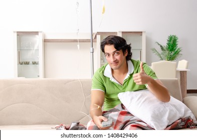 Young Man Suffering At Home 