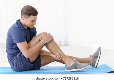 Young Man Suffering Pain Leg Home Stock Photo 717293119 | Shutterstock