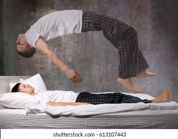 Young Man Suffering From Sleep Paralysis