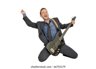 Young Man In A Suit With Guitar