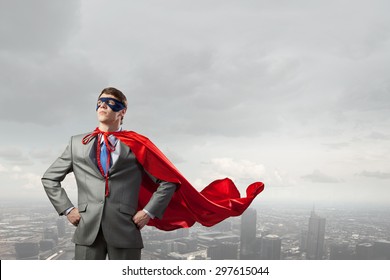 Young Man In Superhero Costume Representing Power And Courage