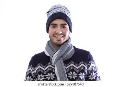 Young Man With Sweater, Scarf And Wool Cap Isolated