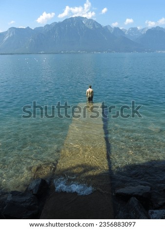 Similar – Foto Bild Bergtour See Mann gelb