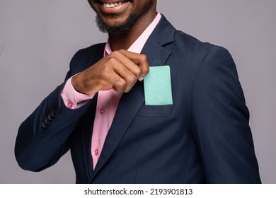 a young man taking a card out of his pocket - Shutterstock ID 2193901813