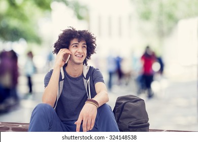 Young Man Talking Mobile Phone