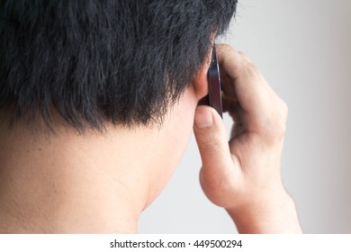 Young Man Talking On Cell Phone