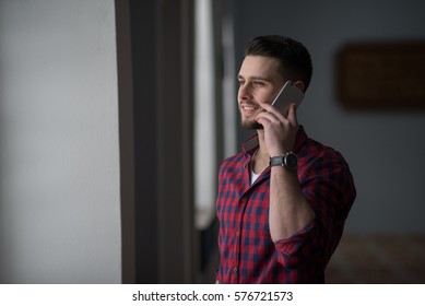 Young Man Talking On Phone