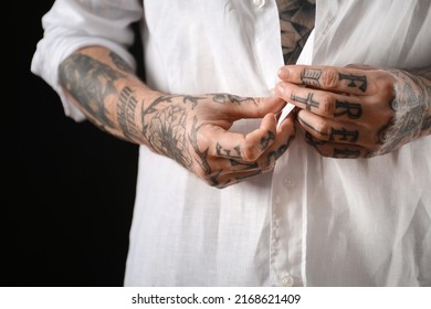 Young man with tattoos on body against black background, closeup - Shutterstock ID 2168621409