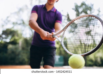 Young Man Tennis Player At The Court, Tennis Racket Close Up