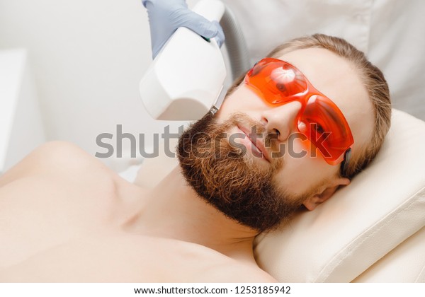 Young Man Thick Beard Safety Glasses Stock Photo Edit Now 1253185942