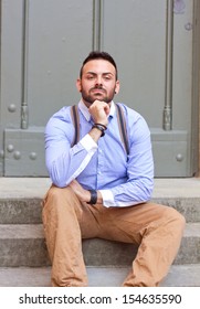 Young man thinking about