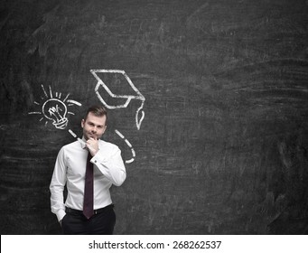 Young man is thinking about further education, - Powered by Shutterstock