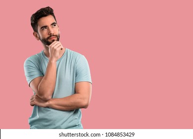 young man thinking about things - Shutterstock ID 1084853429