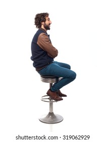 Young Man Thinking With Bar Stool