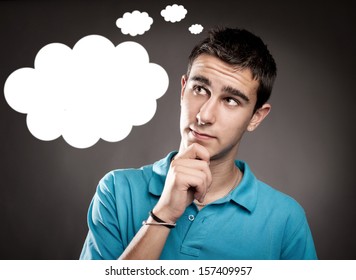 Young Man Thinking With A Cloud Over His Head