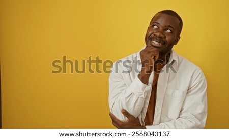 Similar – Image, Stock Photo Thoughtful young bold African American female model in trendy outfit and sunglasses looking away on pink background