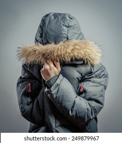 Young Man Tightening Body In Outdoors Cold Weather