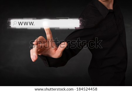 Young man touching web browser address bar with www sign 