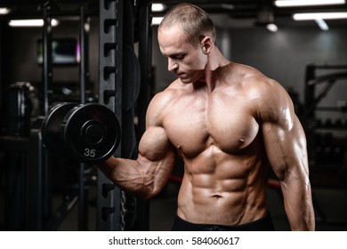 Brutal Strong Athletic Men Pumping Muscles Stock Photo 1243035340 ...