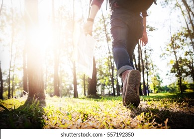 Young Man Traveler With Backpack Relaxing Outdoor With Rocky Mountains On Background Summer Vacations And Lifestyle Hiking Concept