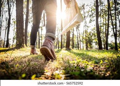 Young Man Traveler with backpack relaxing outdoor with rocky mountains on background Summer vacations and Lifestyle hiking concept