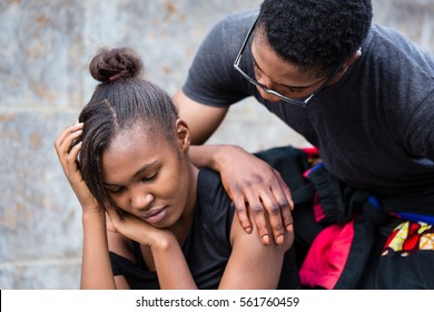 Young Man Trying To Make Up With His Girlfriend Upset After A Fight Outdoors