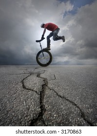 Young Man Unicycle On The Street