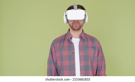 A young man uses vr glasses to work with innovative modeling. Man in 3d glasses