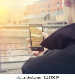 Young man using cellphone