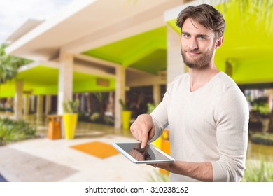 Young man using digital tablet