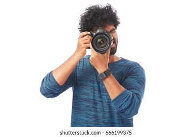 Young Man using DSLR Camera