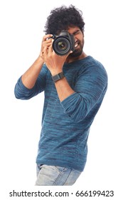 Young Man using DSLR Camera